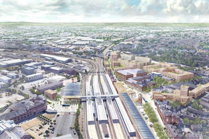artists impression showing the aerial view around a large train station.
