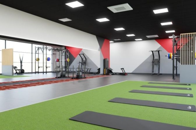 A spacious gym with various workout stations