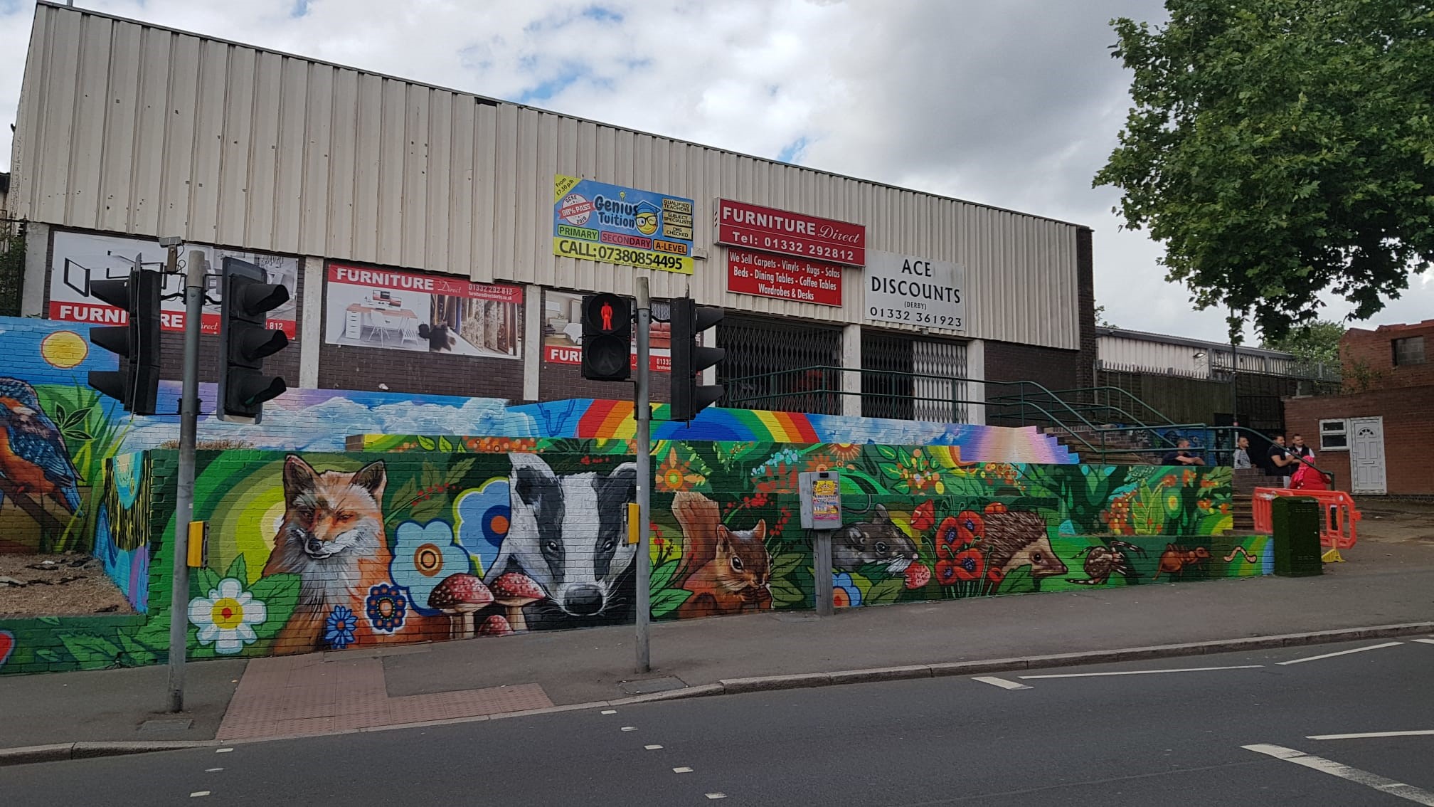 A bright and colourful mural on a wall in Derby