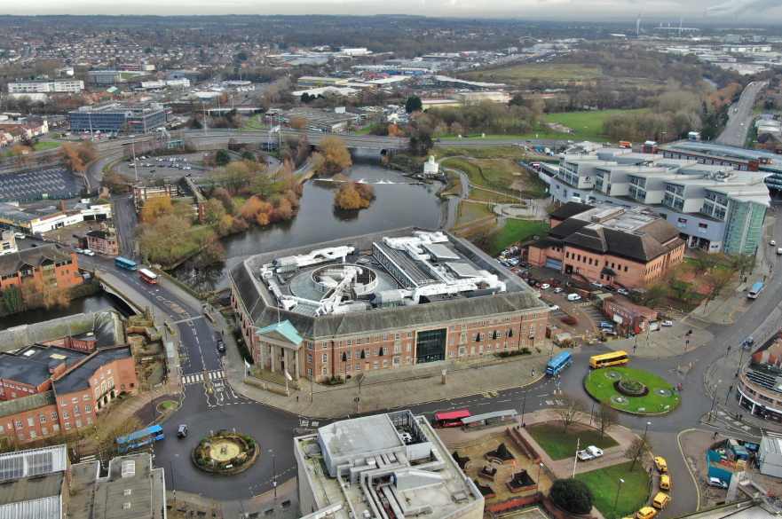 An aerial view of the Council House with the river and bus station in the background