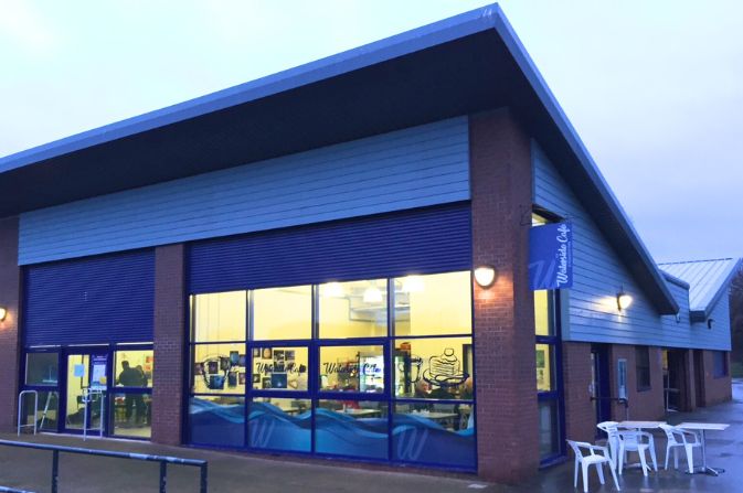 An exterior shot of the Waterside Cafe at Alvaston Park