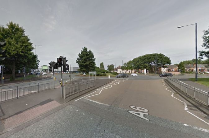 The approach to a large roundabout.