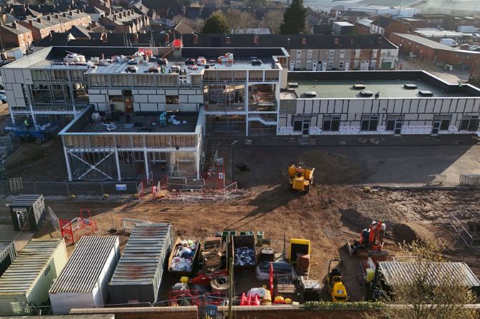 A drone shot of the progress of a school building project