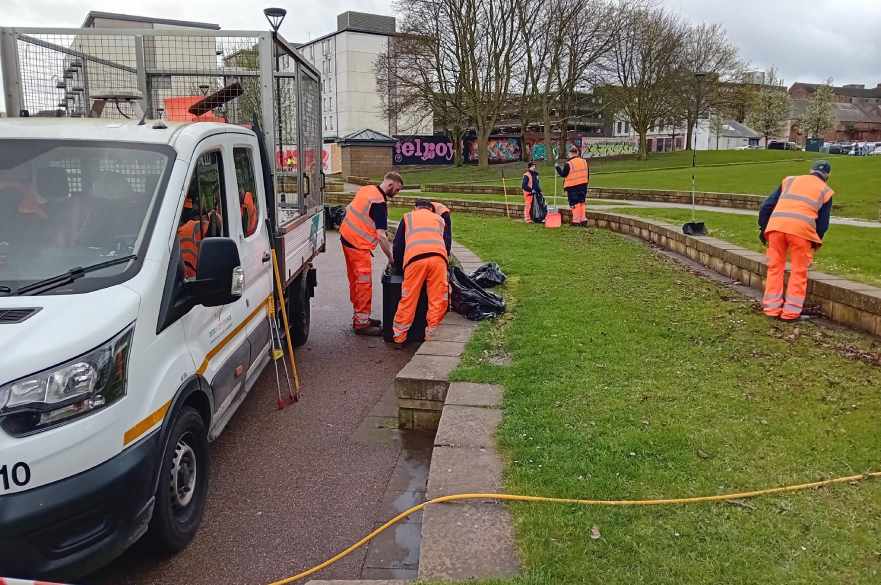 Members of the council's Streetpride team jetwashing in Cathedral Green as part of the Great British Spring Clean 2024