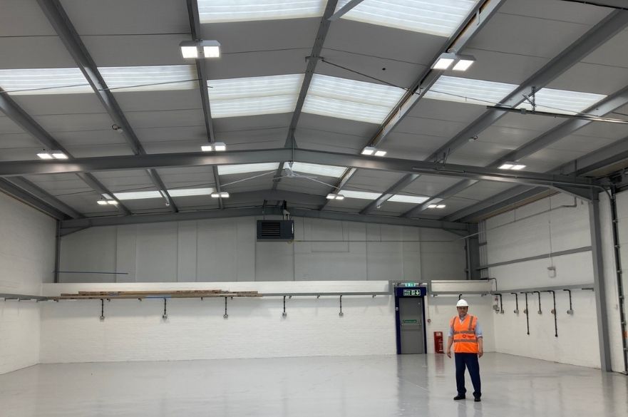 Philip Mason, Production Director at Tidyco with their recently installed LED lighting, destratification fans and efficient heater