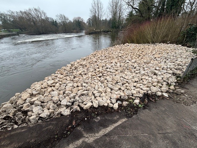 Rocks that were packed into the bank next to the temporary footbridge at Darley Abbey Mills