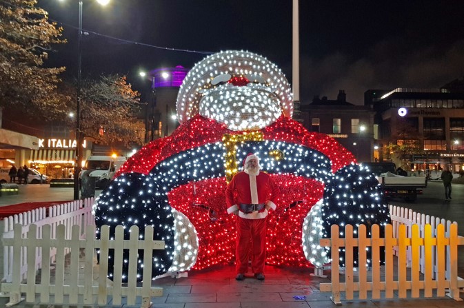 A large light installation in the shape of Santa