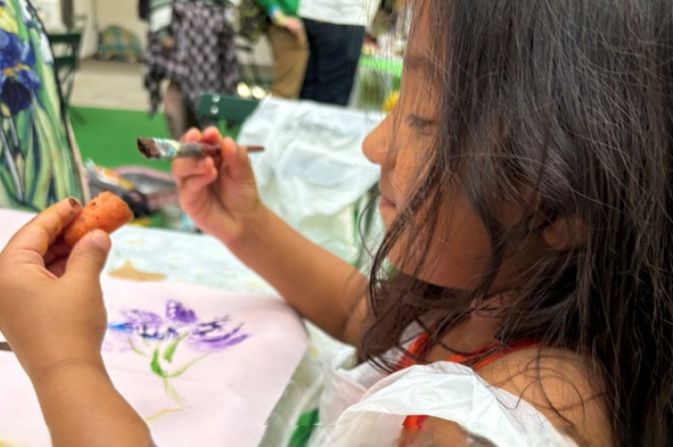 A child doing a craft activity