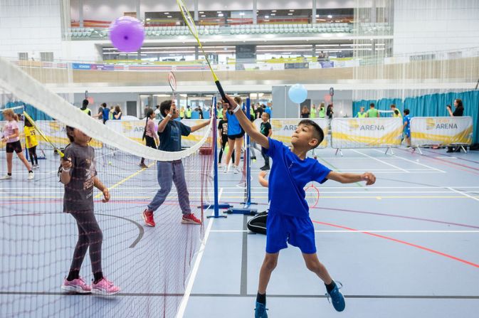 Children playing sport inside Derby Arena sports hall