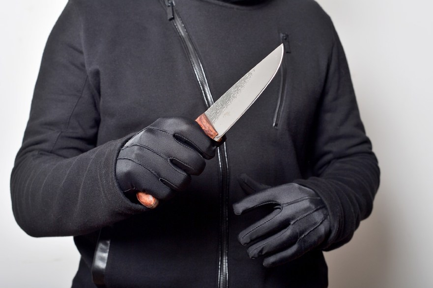 man holding knife crime