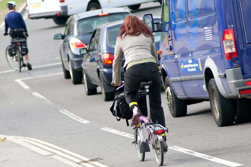 Woman riding fold up bike