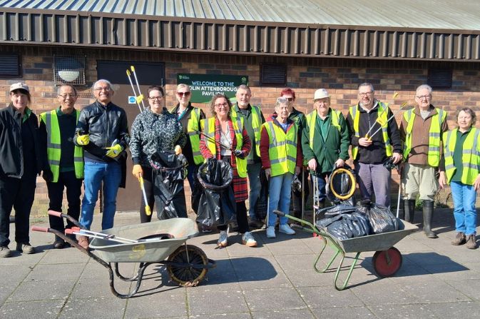 Group of volunteers, councillors and council staff taking part in the Great British Spring Clean in Derby city centre.