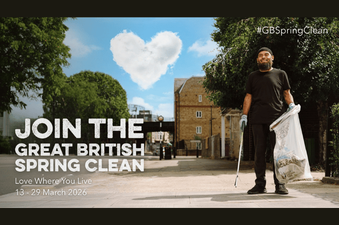 Man holding a litter picker and a bag of collected litter during the Great British Spring Clean, with a heart-shaped cloud in the blue sky and text reading “Join the Great British Spring Clean – Love Where You Live, 13–29 March.